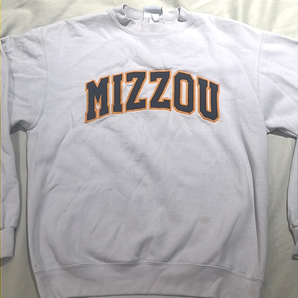 White Mizzou sweater.